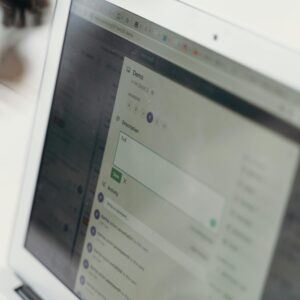 Close-up of a laptop screen showing a web interface for data input and analysis.